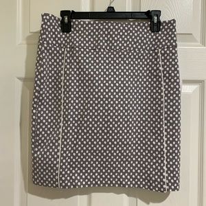 This amazing skirt is not a mini on me.  Hits right at knee.  Fun and perfect